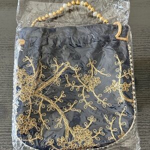 Embroidered Navy and Gold Evening Handbag.  Fair offers